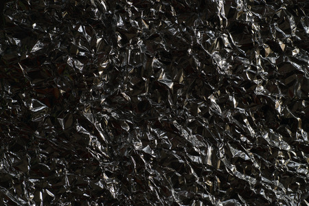 Effective, contrasting background obtained from creased aluminum foil.の写真素材