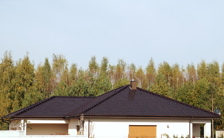 A roof fragment made of ceramic tiles, a newly built residential house.の写真素材