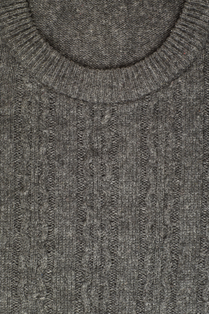 A crew neck (or crew-neck) is a type of shirt or sweater that has a round neckline. Knitwear.の写真素材