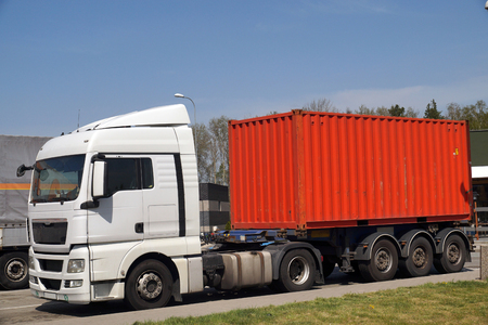 Transport by container truck. Truck in the parking lot during a travel break.の写真素材