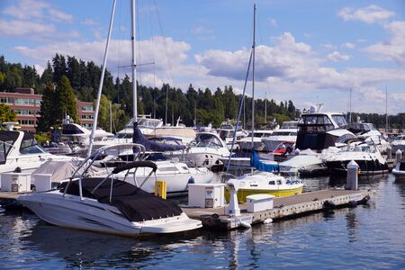 The marina is filled with yachts and motorboats moored here. Lake washington.の写真素材