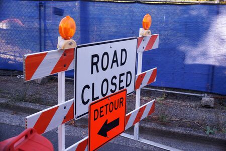 Road signs informing about road closures and detours. Road works.の写真素材