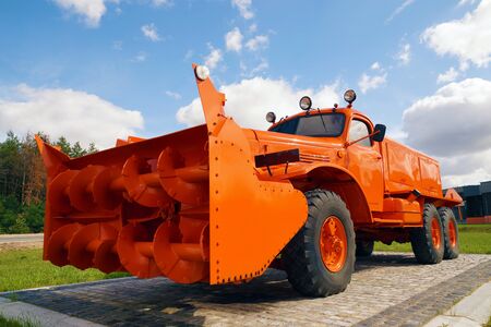 Vehicle display at the highway. Antique snow plow.の写真素材