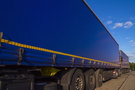 Truck transport. View of the tarpaulin covering the semi-trailer of the truck.の写真素材
