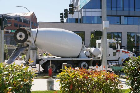 Mixer trucks in city traffic. A city in the USA. の写真素材
