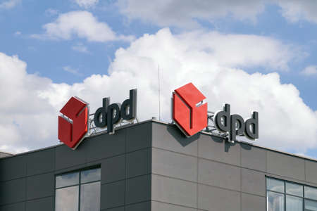 The second largest courier network in Europe. Sign DPDgroup. Forwarding building. Town of Dobra. Poland. April 4, 2020.のeditorial素材