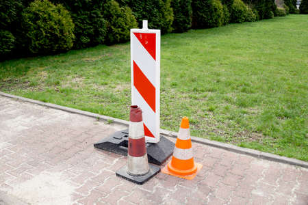 Objects for the organization of road traffic during road works .Three different types of traffic cones.の写真素材