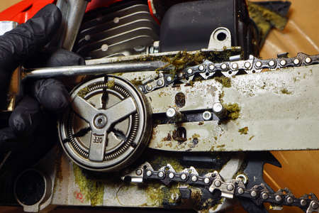 Chain and chain guide bar. Preparing the chainsaw for work. Component overview.の写真素材