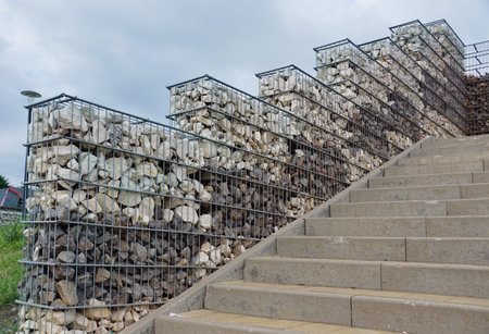 Interesting arrangement of the park space with the use of gabions. Steel baskets filled with two...