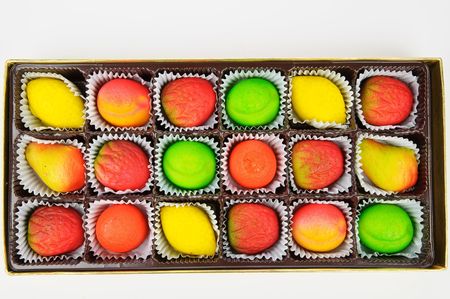 gift box of assorted marzipan in the form of fruitsの写真素材