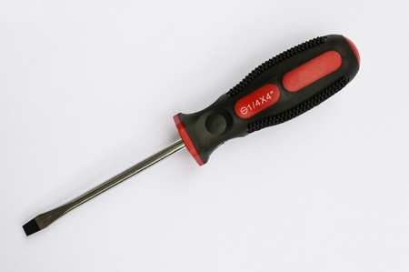 Closeup of slotted screwdriver - studio isolated on white の写真素材