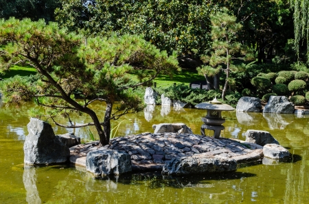 Japanese garden - landscape with pond and islandの写真素材