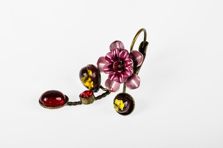 Colorful vintage earring - isolated on white backgroundの写真素材