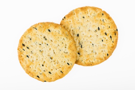 Multigrain crackers - closeup isolated on white background の写真素材