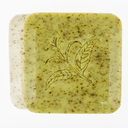 Colorful soap bars with floral pattern - macro isolated on whiteの写真素材