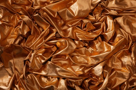 Abstract gold silk backgroundの写真素材