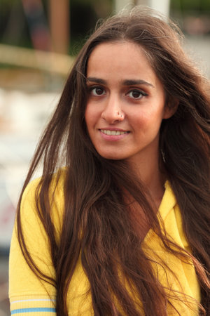 Portrait of the young beautiful woman with magnificent hair