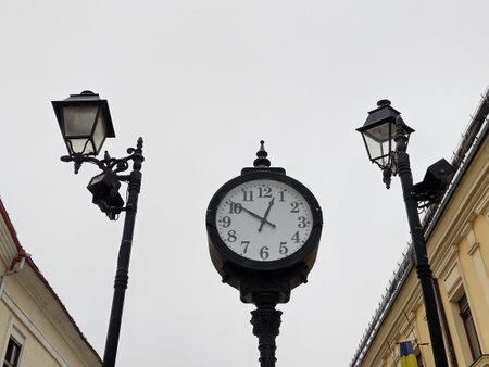clock and buildings in Baia Mare city, Romania