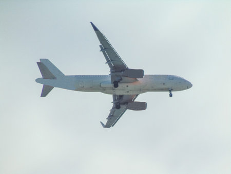 a plane is flying in the sky