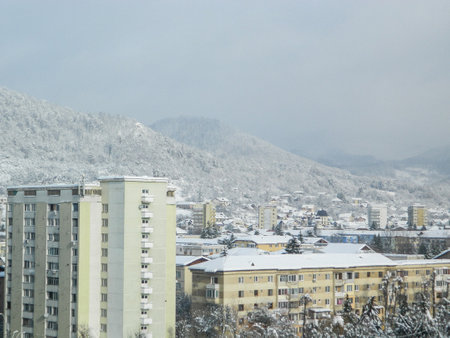 Buildings and snow in Baia Mare city, Romania, in January 2019の写真素材