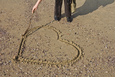 heart drawn in the sand  の写真素材