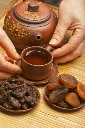 Dried fruits and tea  の写真素材
