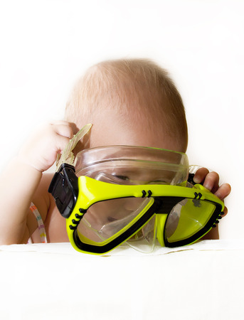 Baby putting the maskの写真素材