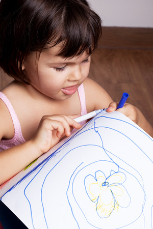 Girl draws paintsの写真素材