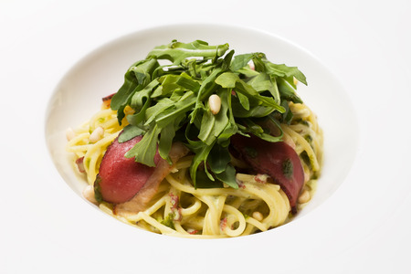 Pasta with tomato sauce and herbsの写真素材