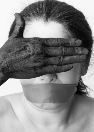 Tied mouth and blindfold eyes.Censored and freedom of speech