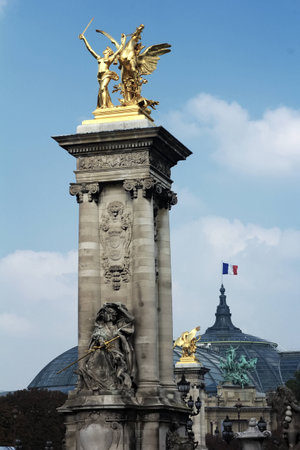 Pillar of bridge \\\"Pont Alexandre III\\\". Pont Alexandre III is an arch famous bridge that spans Seine, connecting Champs-Elysees quarter and Invalides. It is a historical monument. Paris, France.のeditorial素材