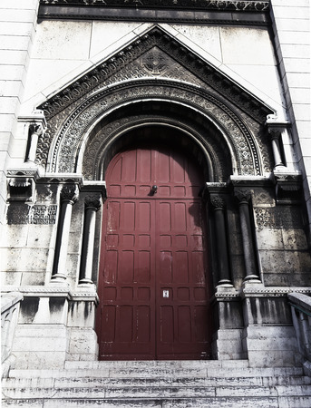 red door at Sacre Coeur in Parisの写真素材