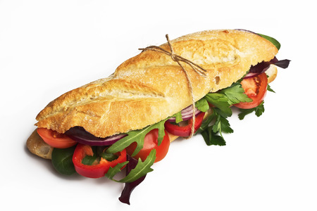 Sandwich with tomatoes, bell pepper,red onion and arugula.の写真素材
