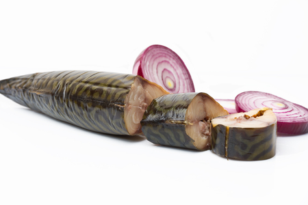 Pieces of smoked mackerel and red onion on white backgroundの写真素材