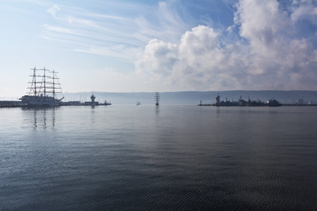Ships in the port with a lighthouse Varna, Bulgaria.
