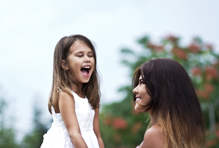 Little cute girl in summer parkの写真素材