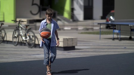 boy is training to play basketball, have funの写真素材