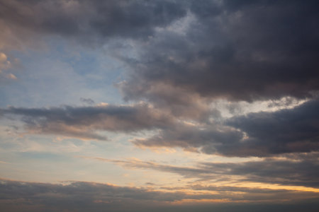 Stunning sunset with very colorful clouds, nature background. Sky, Bright Blue, Orange And Yellow Colors Sunset. Dramatic sunset and sunrise sky. Fiery sunset.の写真素材