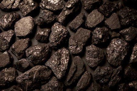 black charcoal, background, close-up. Black charcoal background. Coal texture, view from above. Abstract black charcoal. Textures background.の写真素材
