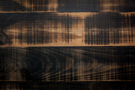 Wooden texture, shabby boards. Old vintage wooden plank board. Old wooden background panel. Cracks of the rough board. Foggy paint. Painted scaly, rough surface. Natural damaged wooden texture.の写真素材