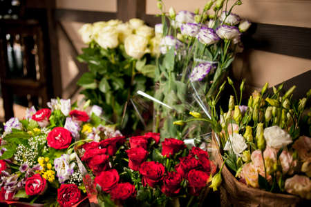 multicolored bouquet of colorful different flowers on blurred background. High quality photoの写真素材
