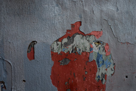 Brick wall with the whitewash falling off fragment as a background texture. Vintage or grungy white background of natural cement or stone old texture as a retro pattern wall.の写真素材