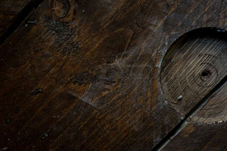 Natural Wood Texture Background. Almond Tree Wood Grained Texture. Dark Wooden Background. old scratched wooden oak board with cracks, vintage background. Old scratch wood wall texture backgroundの写真素材