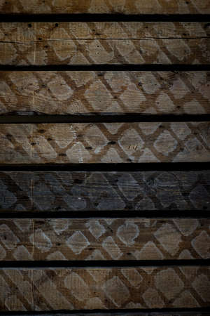 Natural Wood Texture Background. Almond Tree Wood Grained Texture. Dark Wooden Background. old scratched wooden oak board with cracks, vintage background. Old scratch wood wall texture backgroundの写真素材
