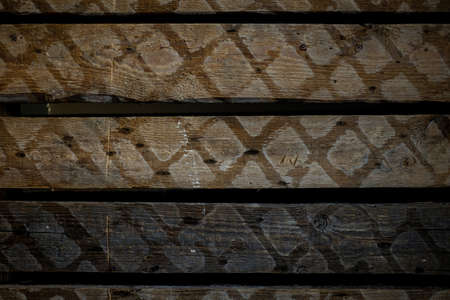 Natural Wood Texture Background. Almond Tree Wood Grained Texture. Dark Wooden Background. old scratched wooden oak board with cracks, vintage background. Old scratch wood wall texture backgroundの写真素材