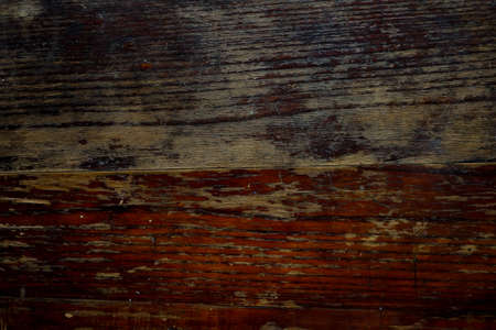 Old scratch wood wall texture background. old scratched wooden oak board with cracks, vintage background. Natural Wood Texture Background. Almond Tree Wood Grained Texture. Dark Wooden Background.の写真素材