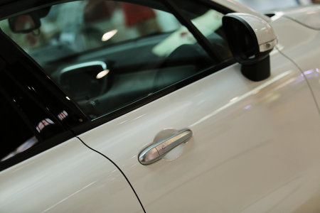door handle of a white car, soft focus. white automobile handle.の写真素材