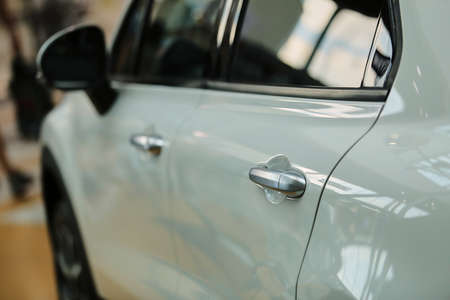 door handle of a white car, soft focus. white automobile handle.の写真素材