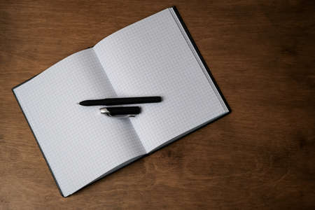 Open the notebook on the office desk. Outdoorの写真素材