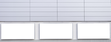 Large blank billboard on a supermarket wall, banners with room to add your own textの写真素材